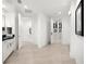 Spacious hallway with access to a walk-in closet and featuring modern fixtures and finishes at 9138 Great Heron Cir, Orlando, FL 32836