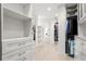 Large walk-in closet with custom shelving, drawer units, and plenty of room for storage at 9138 Great Heron Cir, Orlando, FL 32836