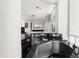 Home wet bar featuring granite countertops, stainless steel sink, and modern cabinetry at 9138 Great Heron Cir, Orlando, FL 32836