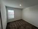 Carpeted bedroom with a window provides a blank canvas for your personal touches at 930 Cattleman St, Winter Haven, FL 33881