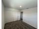 This carpeted bedroom offers ample closet space for storage at 930 Cattleman St, Winter Haven, FL 33881