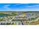 An aerial shot showing the community, ponds, and surrounding environment at 9909 Alliteration Aly, Winter Garden, FL 34787