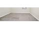 Bedroom featuring soft carpeting, trim, fresh paint, and bright natural lighting at 9909 Alliteration Aly, Winter Garden, FL 34787