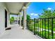 Spacious porch with views of the manicured lawn and neighborhood at 9909 Alliteration Aly, Winter Garden, FL 34787