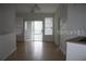 Bright dining room with tile floors and sliding glass doors to the outdoor space at 1101 Vintage Village Ln # 106, Ocoee, FL 34761