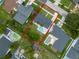 Aerial view of home featuring a private pool and landscaped backyard with ample green space at 1328 Vassar St, Orlando, FL 32804