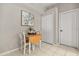 Cozy breakfast nook with a drop leaf table, a storage closet, and neutral paint at 14016 Fox Glove St, Winter Garden, FL 34787