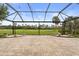 Spacious covered patio featuring brick flooring and a view of the golf course at 14016 Fox Glove St, Winter Garden, FL 34787