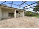 Spacious patio featuring brick flooring, pillars, covered area and a back yard at 14016 Fox Glove St, Winter Garden, FL 34787