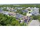 A charming neighborhood showcases lush greenery and diverse home styles, offering a vibrant community at 14044 Chicora Crossing Blvd, Orlando, FL 32828