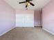 Bright bedroom with neutral carpet and large closets at 14044 Chicora Crossing Blvd, Orlando, FL 32828
