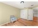 Bedroom with chair and closet space at 14213 Turning Leaf Dr, Orlando, FL 32828