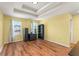 Well-lit bedroom with hardwood floors, neutral walls and furniture, and natural light at 14213 Turning Leaf Dr, Orlando, FL 32828