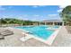 Stunning pool area with clear blue water and comfortable lounge chairs, perfect for relaxation and leisure at 14213 Turning Leaf Dr, Orlando, FL 32828