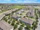 Aerial view of townhomes near a park and school at 15477 Blackbead St, Winter Garden, FL 34787