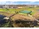 Community with tennis courts and scenic walking trails and bridges surround waterway at 15477 Blackbead St, Winter Garden, FL 34787
