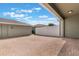 Spacious backyard patio area featuring brick flooring and a white privacy fence at 15477 Blackbead St, Winter Garden, FL 34787