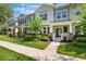 Attractive townhome showcases well-maintained landscaping, enhancing its curb appeal and overall charm at 15477 Blackbead St, Winter Garden, FL 34787