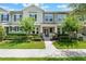 Charming townhome with a covered front porch, perfect for enjoying neighborhood views at 15477 Blackbead St, Winter Garden, FL 34787