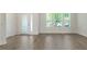 Bright, open-concept living space with beautiful floors and ample natural light at 15477 Blackbead St, Winter Garden, FL 34787