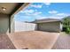 Brick-paved patio with privacy fence, ideal for outdoor gatherings and enjoying the sunshine at 15477 Blackbead St, Winter Garden, FL 34787