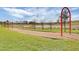 Outdoor playground surrounded by grass and mulch at 15477 Blackbead St, Winter Garden, FL 34787