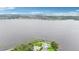 Waterfront property boasts stunning lake views and a private dock for the ultimate lakeside living experience at 15779 Tangerine Dream Ct, Winter Garden, FL 34787