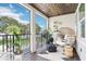Inviting balcony featuring seating and plants overlooking the water at 15779 Tangerine Dream Ct, Winter Garden, FL 34787