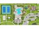 Aerial view showcasing community amenities including a pool, tennis courts, playground, and green spaces at 15779 Tangerine Dream Ct, Winter Garden, FL 34787
