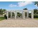 Outdoor community area featuring a pergola and comfortable seating, perfect for social gatherings and relaxation at 15779 Tangerine Dream Ct, Winter Garden, FL 34787