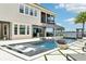 Resort-style pool and outdoor living space create the perfect setting for relaxation and entertainment by the water at 15779 Tangerine Dream Ct, Winter Garden, FL 34787