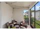 Charming screened-in patio provides a relaxing outdoor living space at 16013 Tollington Aly, Winter Garden, FL 34787