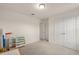 Clean bedroom showcasing double closets and neutral carpet, offering practical storage solutions at 1613 Water Elm Ct, Orlando, FL 32825