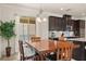 Breakfast nook featuring a chandelier and sliding doors to the outdoor space at 1613 Water Elm Ct, Orlando, FL 32825