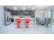Modern kitchen with stainless steel appliances and dining area with modern decor at 171 Seville Dr, Davenport, FL 33837