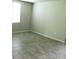 Bedroom featuring tile floors and a window at 17305 Cagan Crossings Blvd, Clermont, FL 34714