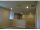 Upstairs loft area offering versatile living space with ample lighting and carpeting at 17305 Cagan Crossings Blvd, Clermont, FL 34714