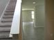 Carpeted staircase leading to the upper level of the home at 17305 Cagan Crossings Blvd, Clermont, FL 34714