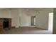 Large living room features vaulted ceiling, fireplace and plush carpet at 2008 Juniper Dr, Edgewater, FL 32141