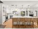 Beautiful, bright kitchen featuring a large island with bar seating at 207 Ramsbury Ct, Longwood, FL 32779