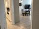 View of the dining room and kitchen with a seamless flow at 2305 Butterfly Palm Way # 304, Kissimmee, FL 34747