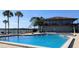 Refreshing community pool with a water view, promising relaxation and recreation at 2500 21St Nw St # 58, Winter Haven, FL 33881