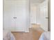 Bright bedroom featuring a large closet, neutral carpet, and an open doorway to the rest of the home at 2821 Almaton Loop # 105, Kissimmee, FL 34747