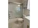 Bathroom featuring shower with glass doors and modern fixtures at 2864 Trenton Ln, Deltona, FL 32738
