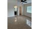 Bedroom featuring an adjacent bathroom, large closet, and natural lighting at 2864 Trenton Ln, Deltona, FL 32738