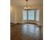 Bright dining room featuring tile floors and a bay window with bright sunlight at 2864 Trenton Ln, Deltona, FL 32738