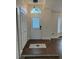 Inviting entryway with stylish tile flooring and a front door with a transom window at 2864 Trenton Ln, Deltona, FL 32738