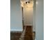 Hallway featuring updated flooring and neutral paint at 2864 Trenton Ln, Deltona, FL 32738