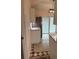 Stylish kitchen featuring white cabinetry and stainless steel appliances, with a sliding glass door at 2864 Trenton Ln, Deltona, FL 32738