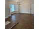 This elegant living room features tile floors, large windows, and contemporary lighting at 2864 Trenton Ln, Deltona, FL 32738